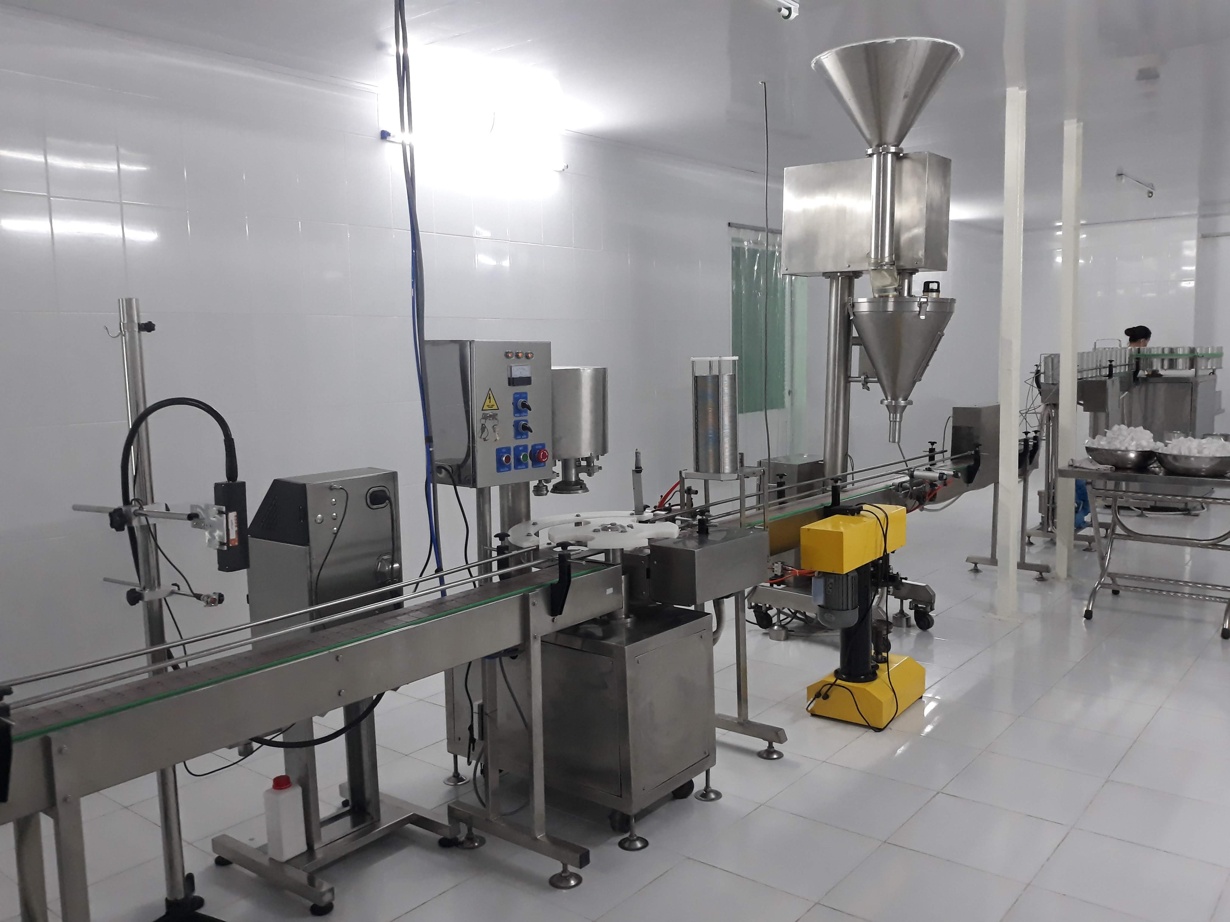 Dây chuyền chiết ghép lon sữa bột tự động, liệu dạng bột